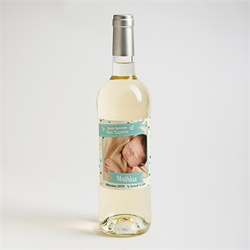 Etiquette de bouteille baptême pois et confettis garçon - Mise en situation