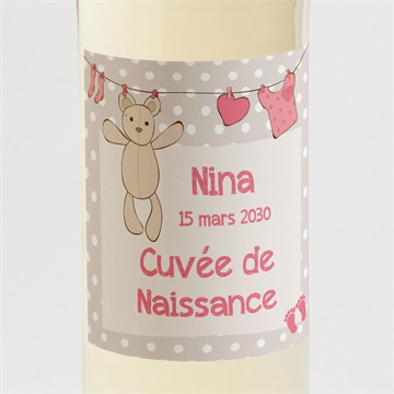 Etiquette de bouteille naissance fil à linge illustré