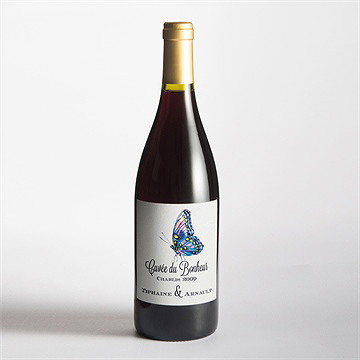 Etiquette de bouteille mariage univers végétal et papillons - Mise en situation