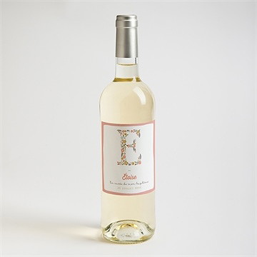 Etiquette de bouteille baptême initiales à motifs - Mise en situation