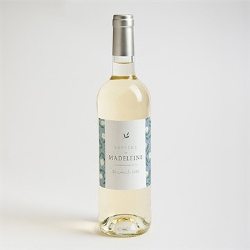 Etiquette de bouteille baptême cadre végétal - Mise en situation