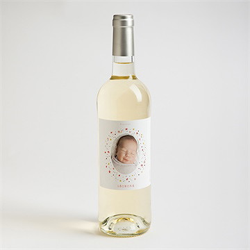 Etiquette de bouteille baptême portrait en tourbillon - Mise en situation