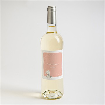 Etiquette de bouteille baptême petit lapin baptême - Mise en situation