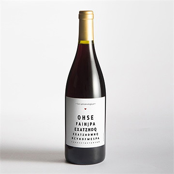 Étiquette bouteille annonce grossesse test ophtalmologique - Mise en situation